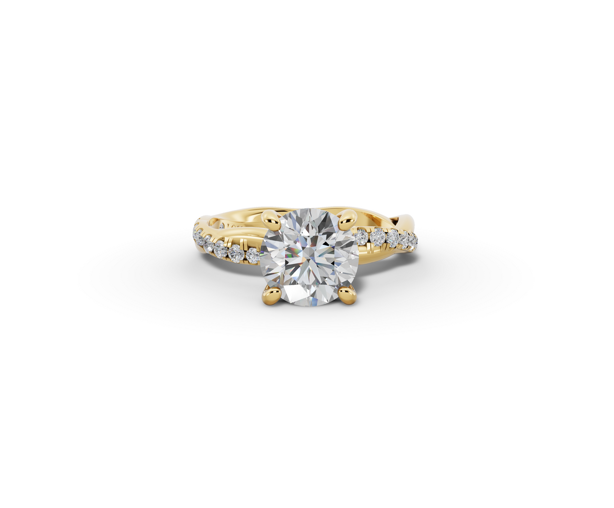 Mira Round Shape Ring in 18K yellow gold with diamonds on the band, set with a LOYA diamond (lying view)