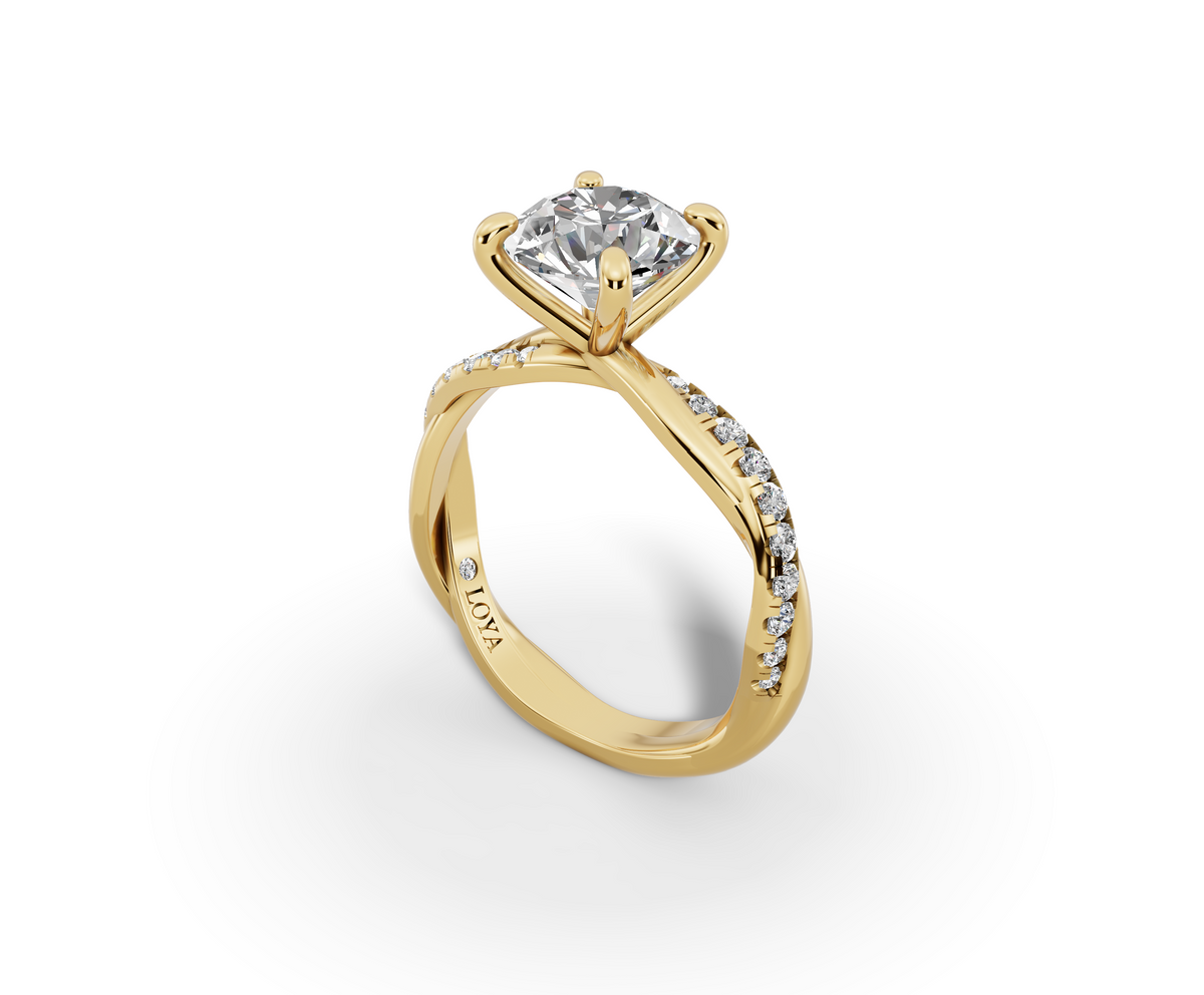 Mira Round Shape Ring in 18K yellow gold with diamonds on the band, set with a LOYA diamond (perspective view)