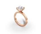 Nova Round Shape Ring in 18K rose gold with a plain band, set with a LOYA diamond (perspective view)