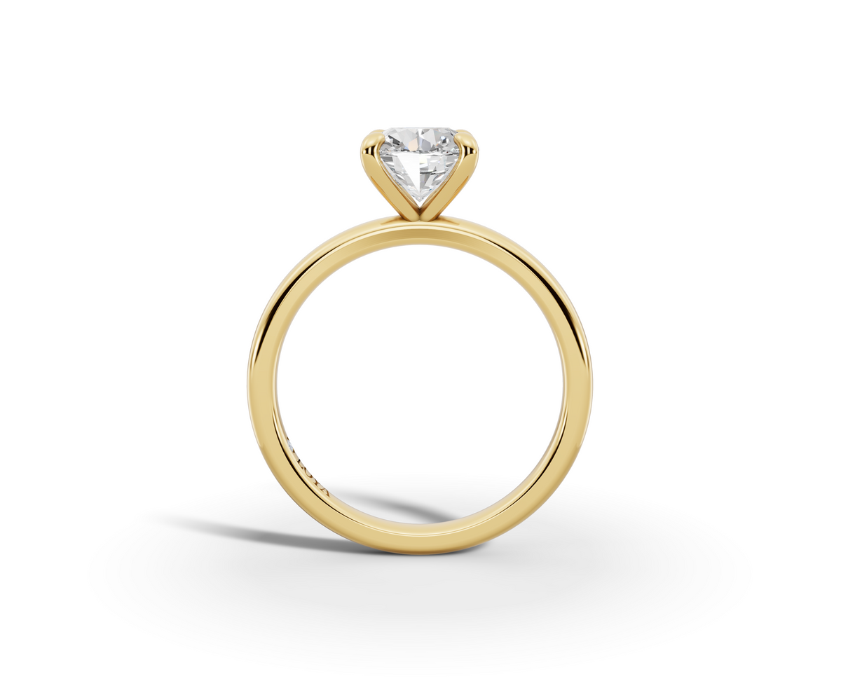 Amor Round Shape Ring in 18K yellow gold with a plain band, set with a LOYA diamond (side view)