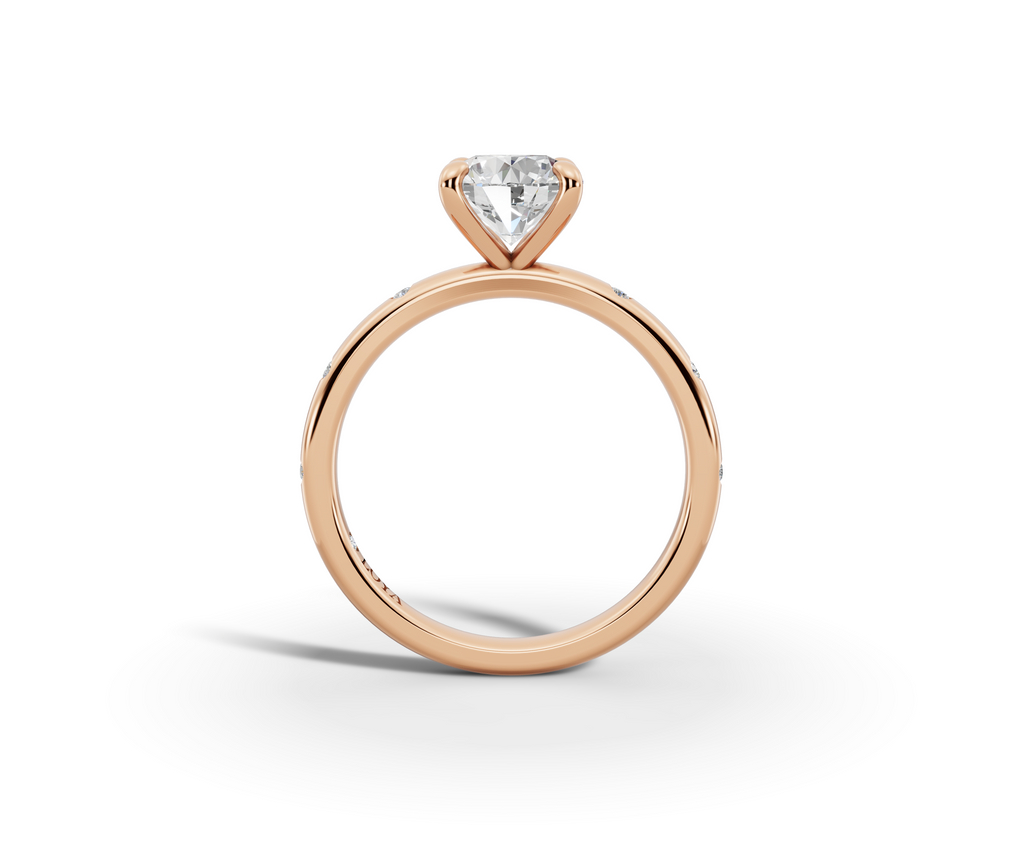 Amor Round Shape Ring in 18K rose gold with diamonds on the band, set with a LOYA diamond (side view)