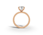 Nova Round Shape Ring in 18K rose gold with diamonds on the band, set with a LOYA diamond (side view)