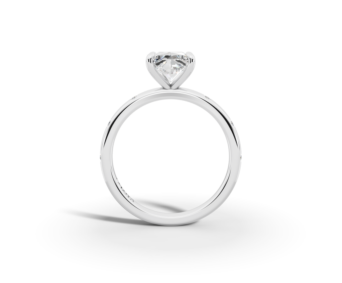 Amor Princess Shape Ring in 18K white gold with diamonds on the band, set with a LOYA diamond (side view)