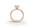Amor Heart Shape Ring in 18K rose gold with diamonds on the band, set with a LOYA diamond (side view)