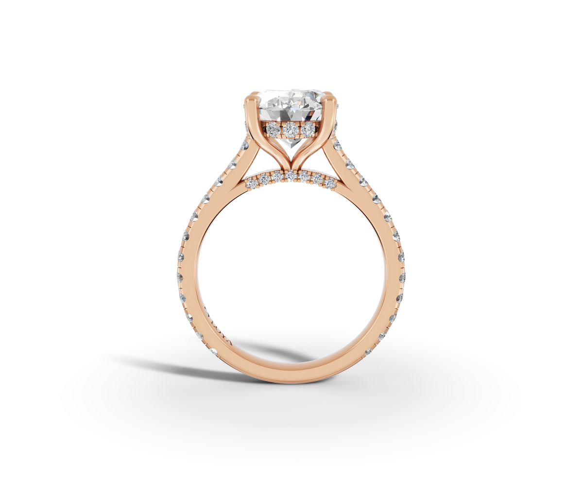 Alba Oval Shape Ring in 18K rose gold with diamonds on the band, set with a LOYA diamond (side view)