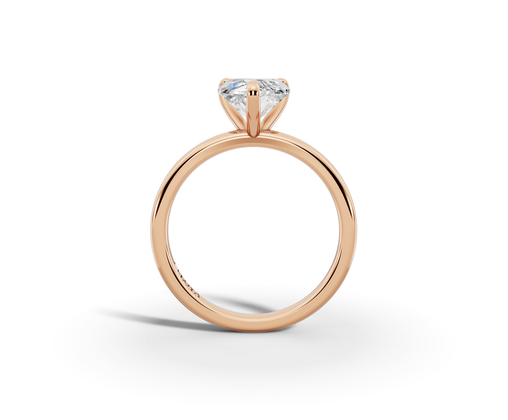 Amor Heart Shape Ring in 18K rose gold with a plain band, set with a LOYA diamond (side view)