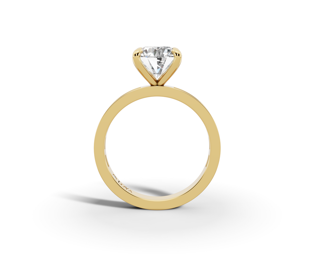 Nova Round Shape Ring in 18K white gold with a plain band, set with a LOYA diamond (side view)