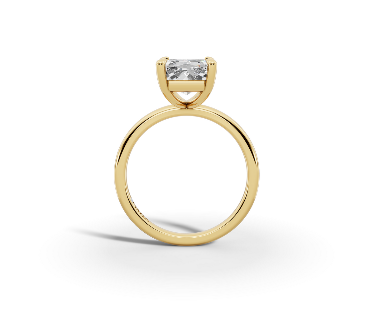 Vita Radiant Shape Ring in 18K yellow gold with a plain band, set with a LOYA diamond (side view)