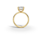 Vita Radiant Shape Ring in 18K yellow gold with diamonds on the band, set with a LOYA diamond (side view)