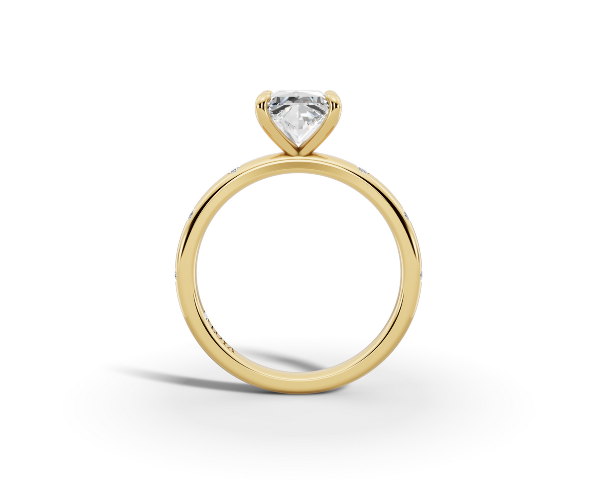 Amor Princess Shape Ring in 18K yellow gold with diamonds on the band, set with a LOYA diamond (side view)