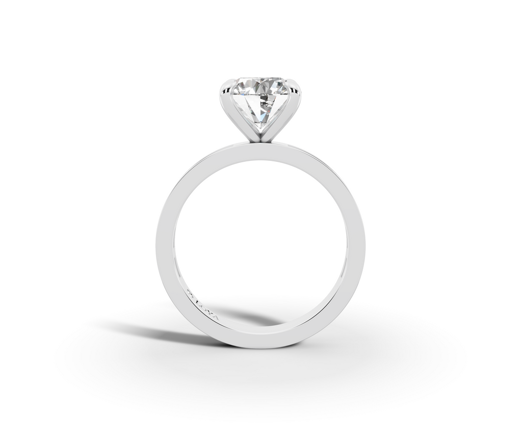 Nova Round Shape Ring in 18K white gold with diamonds on the band, set with a LOYA diamond (side view)