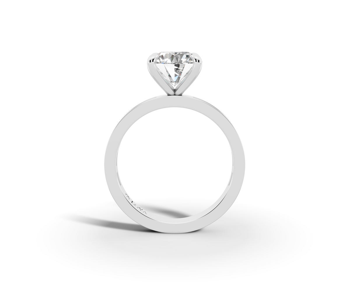 Nova Round Shape Ring in 18K white gold with diamonds on the band, set with a LOYA diamond (side view)