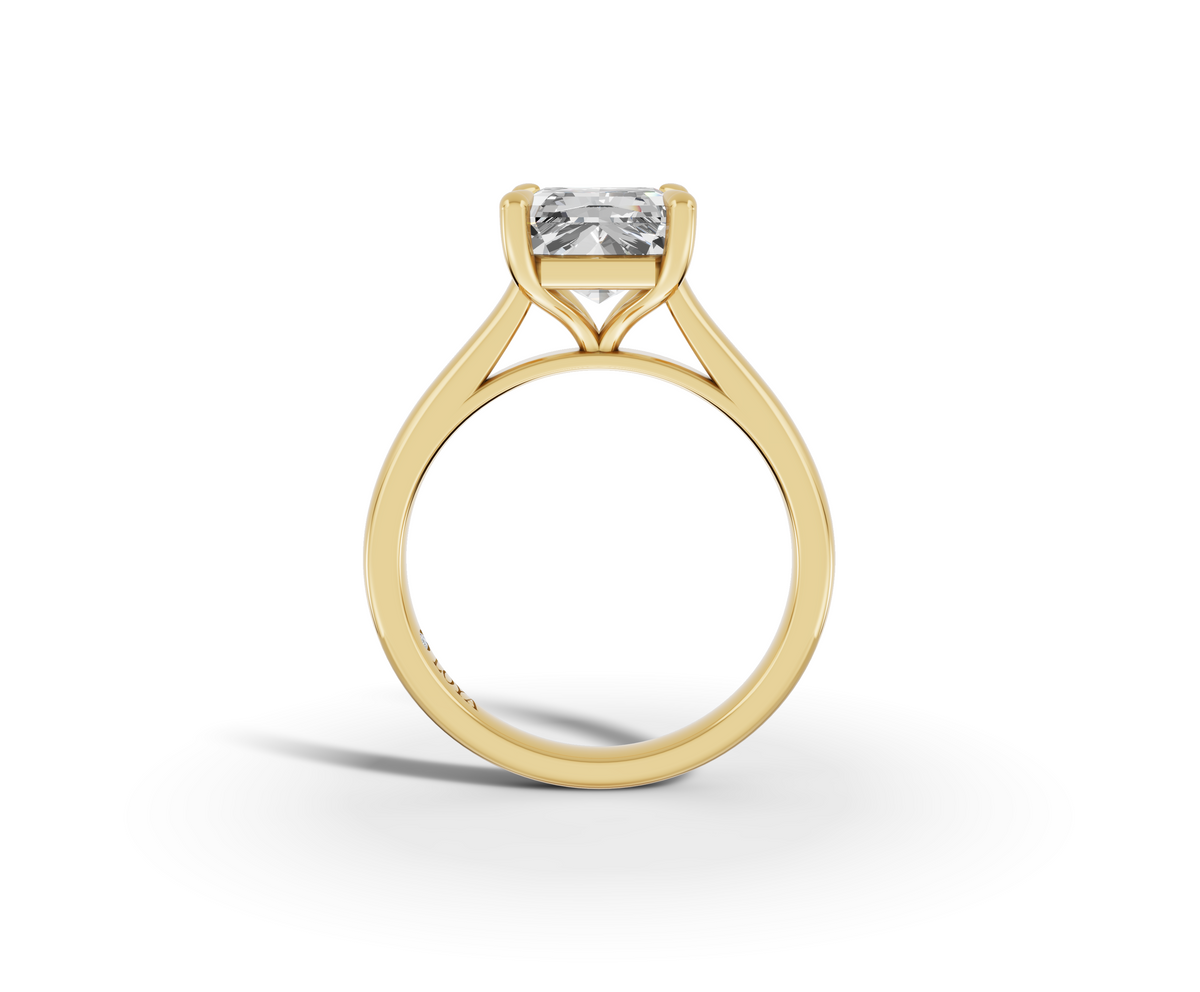 Alba Radiant Shape Ring in 18K yellow gold with a plain band, set with a LOYA diamond (side view)