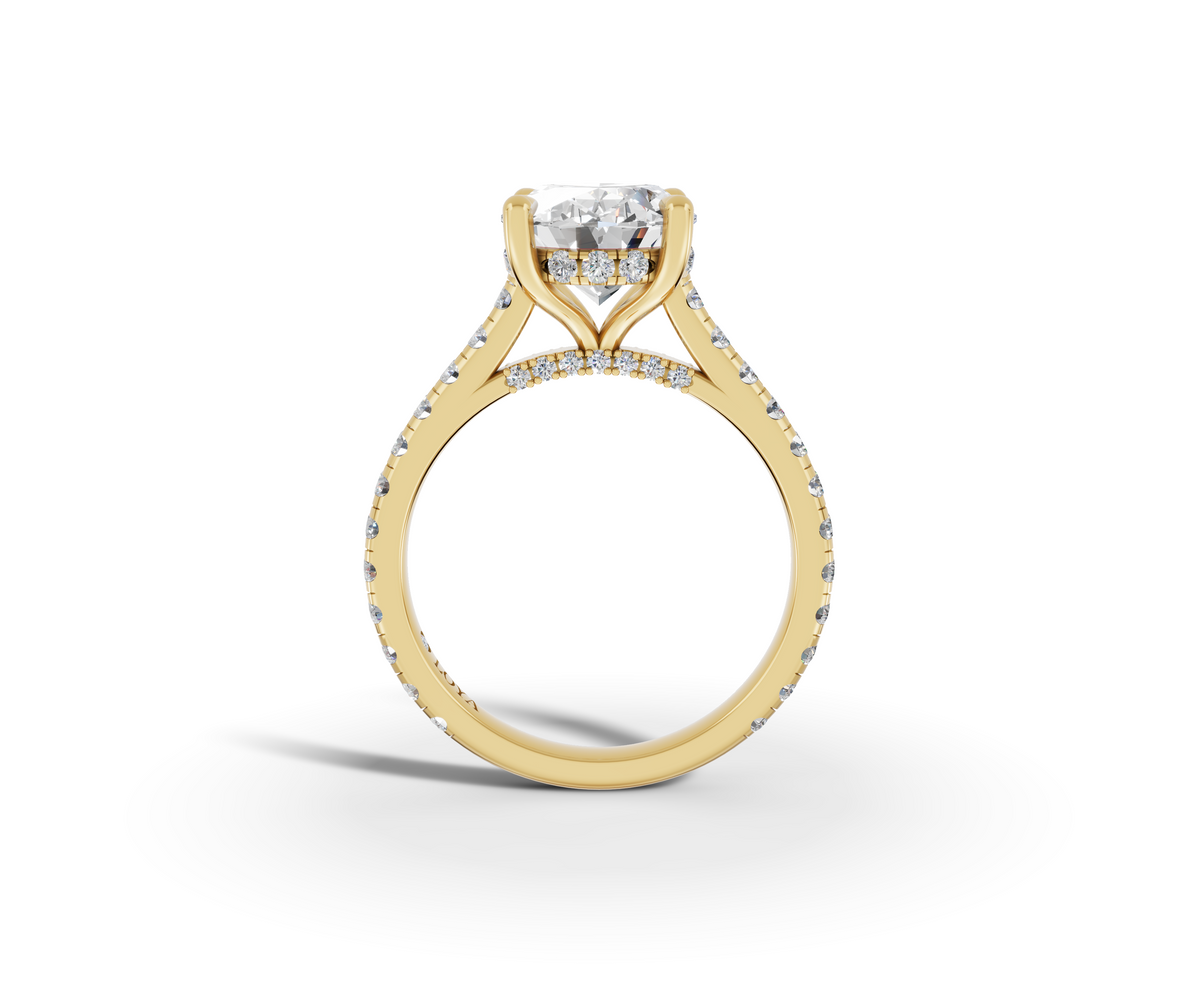 Alba Oval Shape Ring in 18K yellow gold with diamonds on the band, set with a LOYA diamond (side view)
