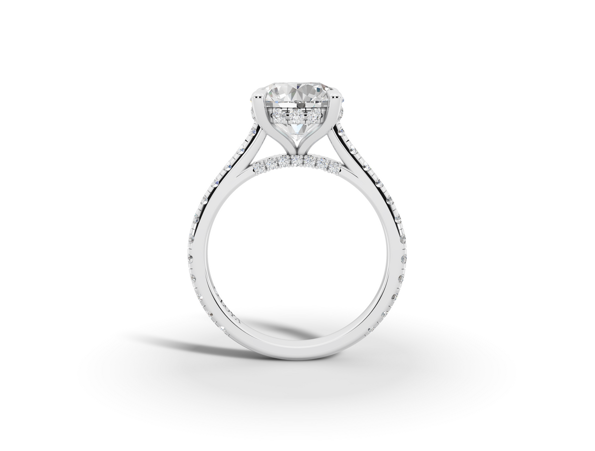 Alba Round Shape Ring in 18K white gold with diamonds on the band, set with a LOYA diamond (side view)