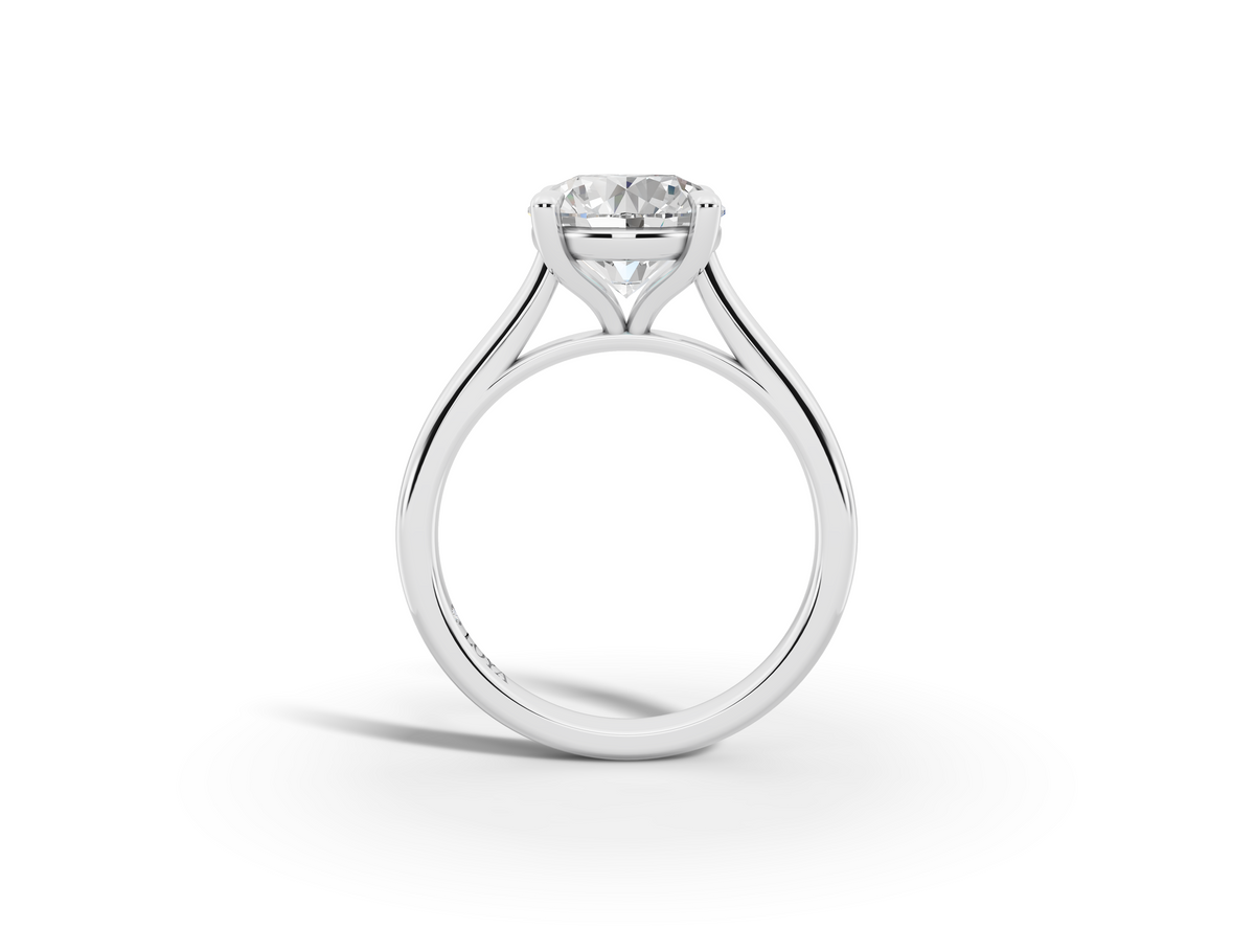 Alba Round Shape Ring in 18K white gold with a plain band, set with a LOYA diamond (side view)