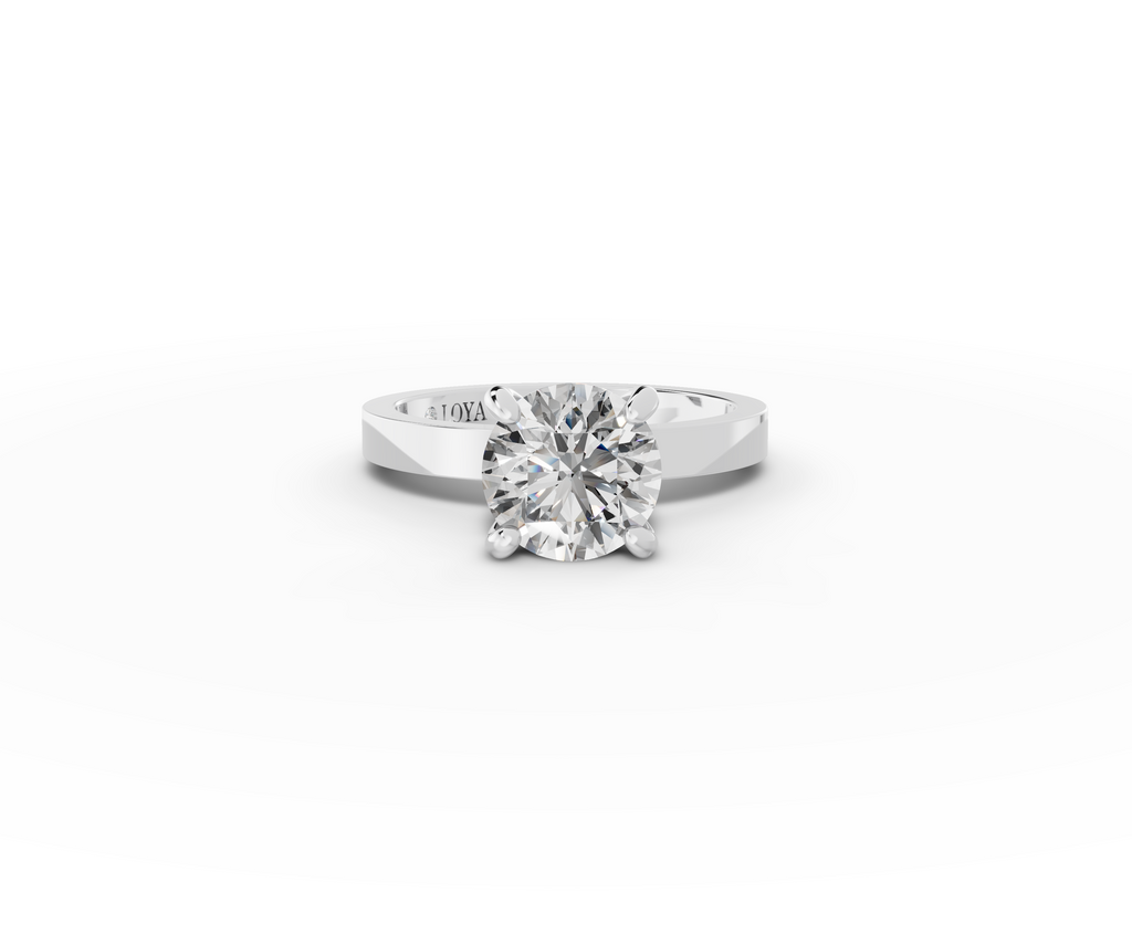 Nova Round Shape Ring in 18K white gold with a plain band, set with a LOYA diamond (lying view)