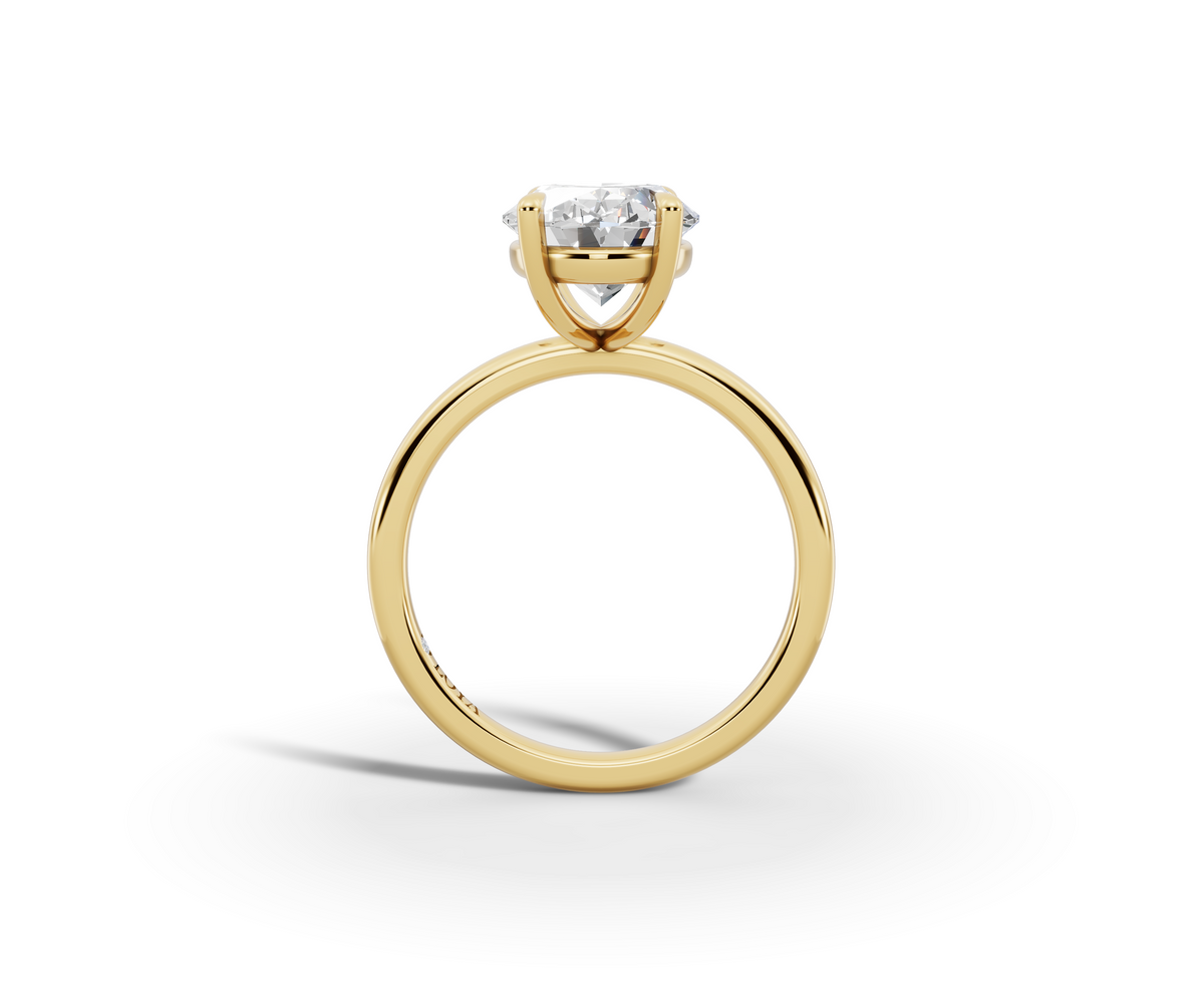 Vita Thin Oval Shape Ring in 18K yellow gold with a plain band, set with a LOYA diamond