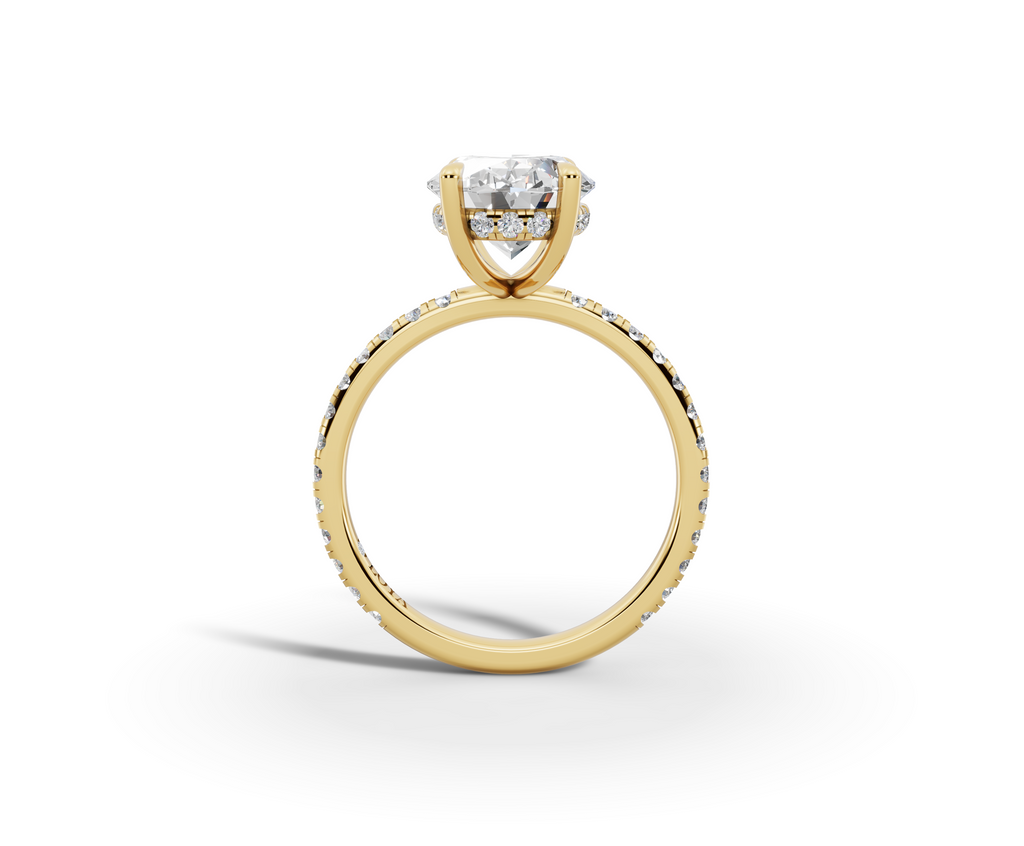 Vita Thin Oval Shape Ring in 18K yellow gold with diamonds on the band, set with a LOYA diamond