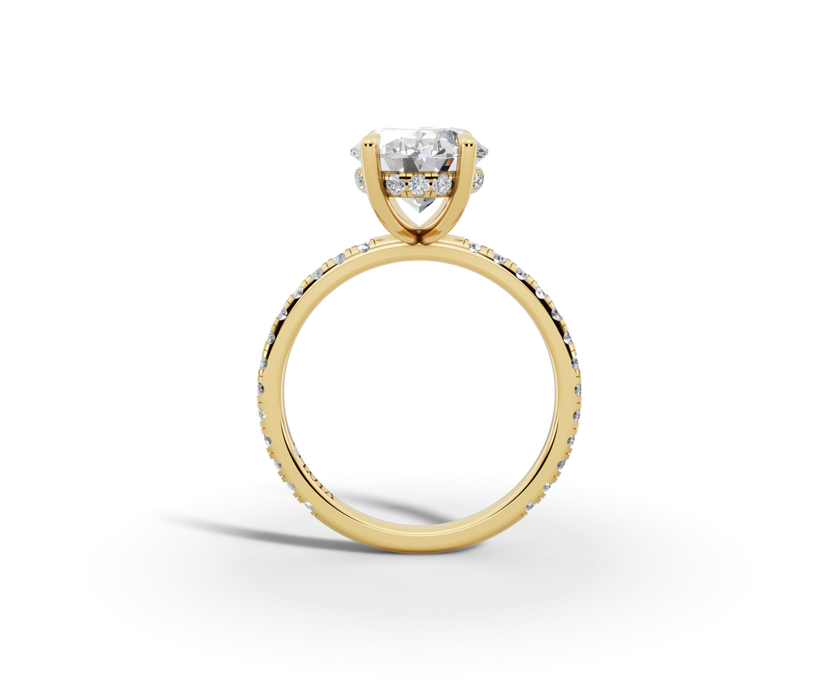 Vita Thin Oval Shape Ring in 18K yellow gold with diamonds on the band, set with a LOYA diamond