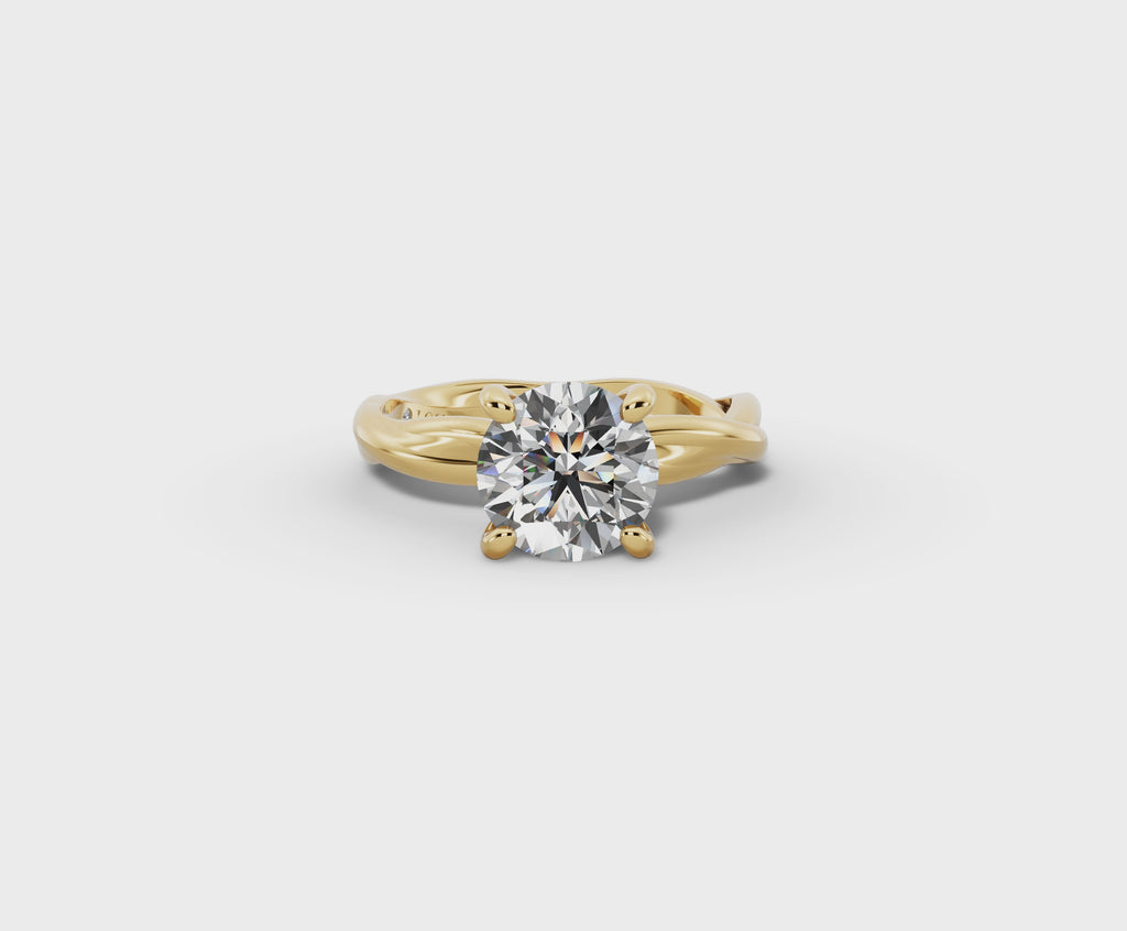 Mira Round Shape Ring in 18K yellow gold with a plain band, set with a LOYA diamond