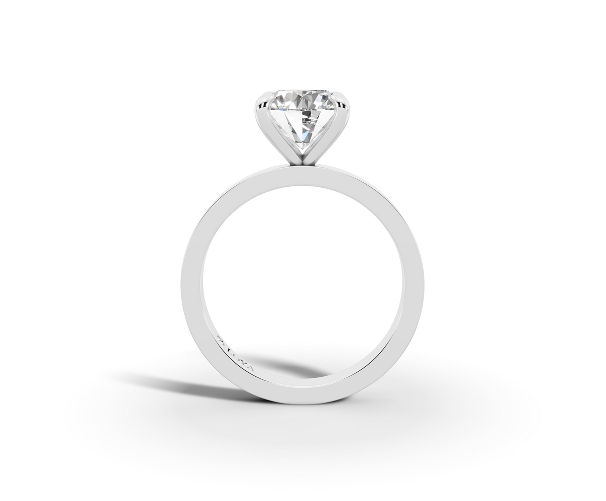 Nova Round Shape Ring in 18K white gold with a plain band, set with a LOYA diamond (side view)